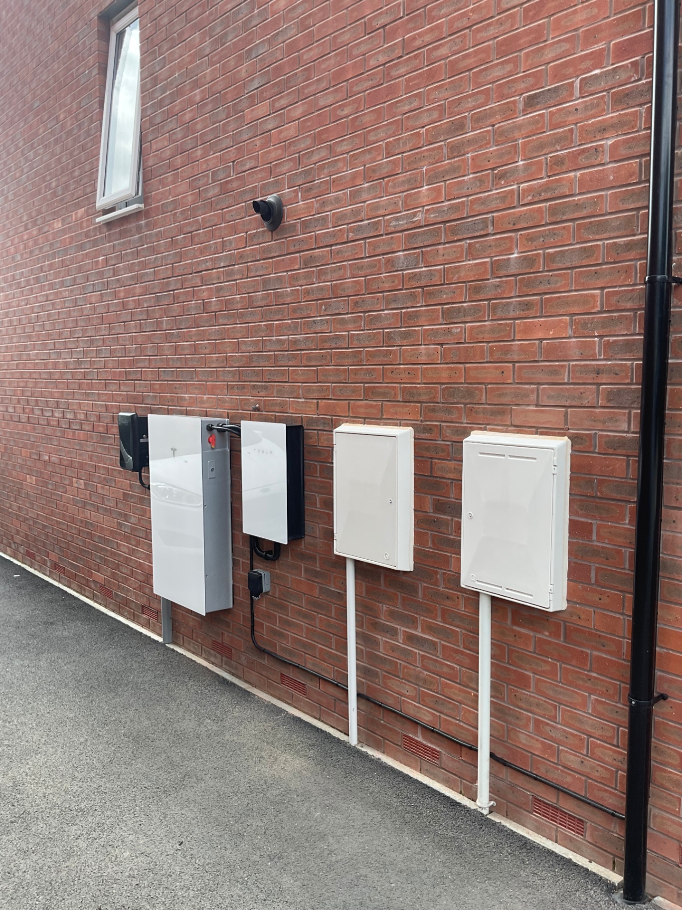 Tesla Powerwall and home EV charger installation completed by Engage Solar on a Devon property