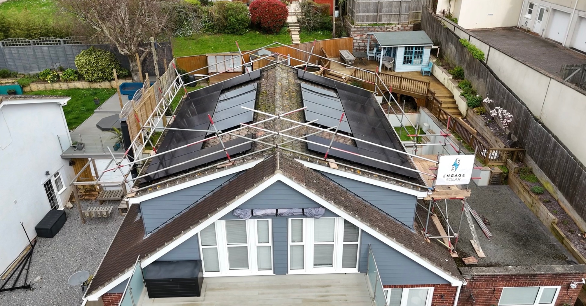 Additional solar panels added to a residential roof during a retrofit project in Devon