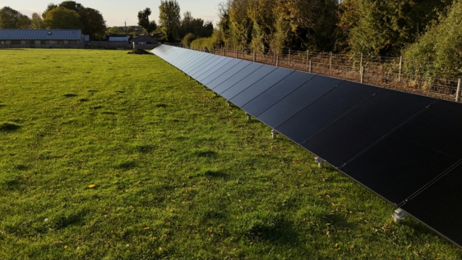 Ground mounted solar panel array in green English countryside