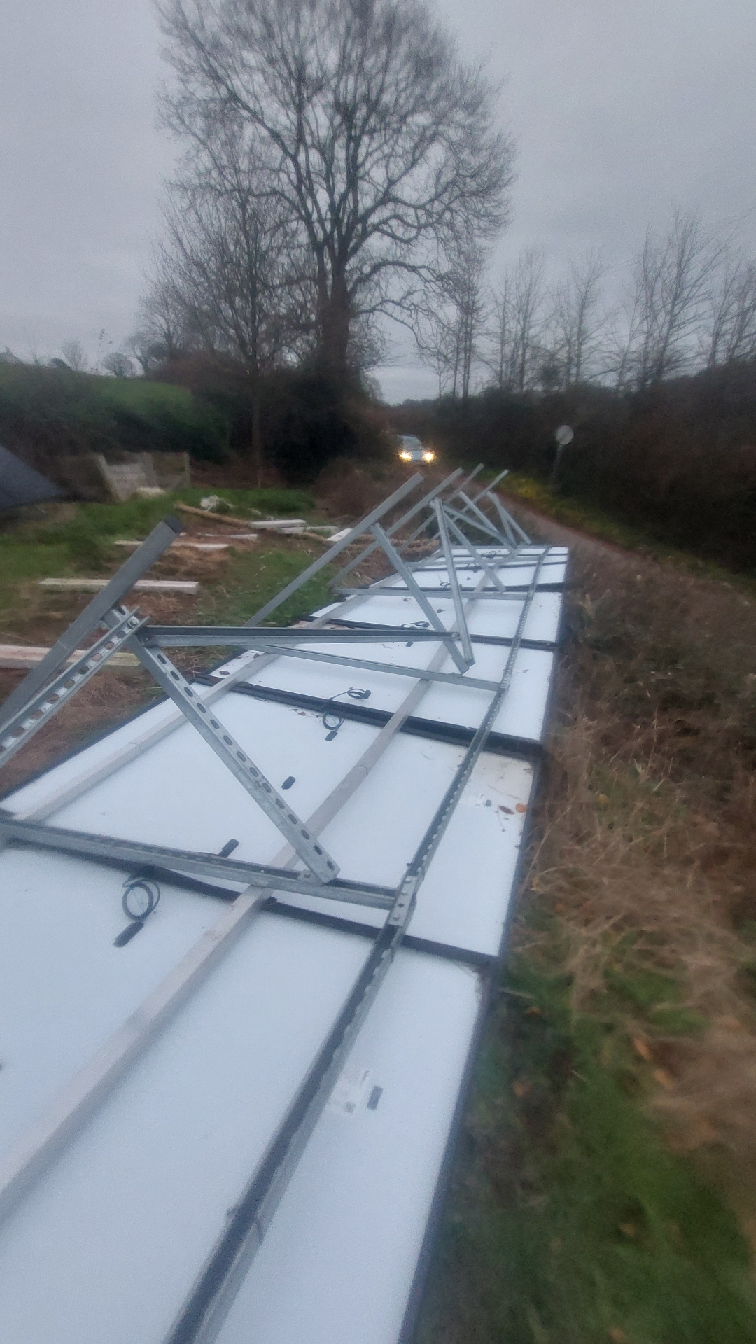 Ground-mounted solar frame installation in progress on a rural Devon site