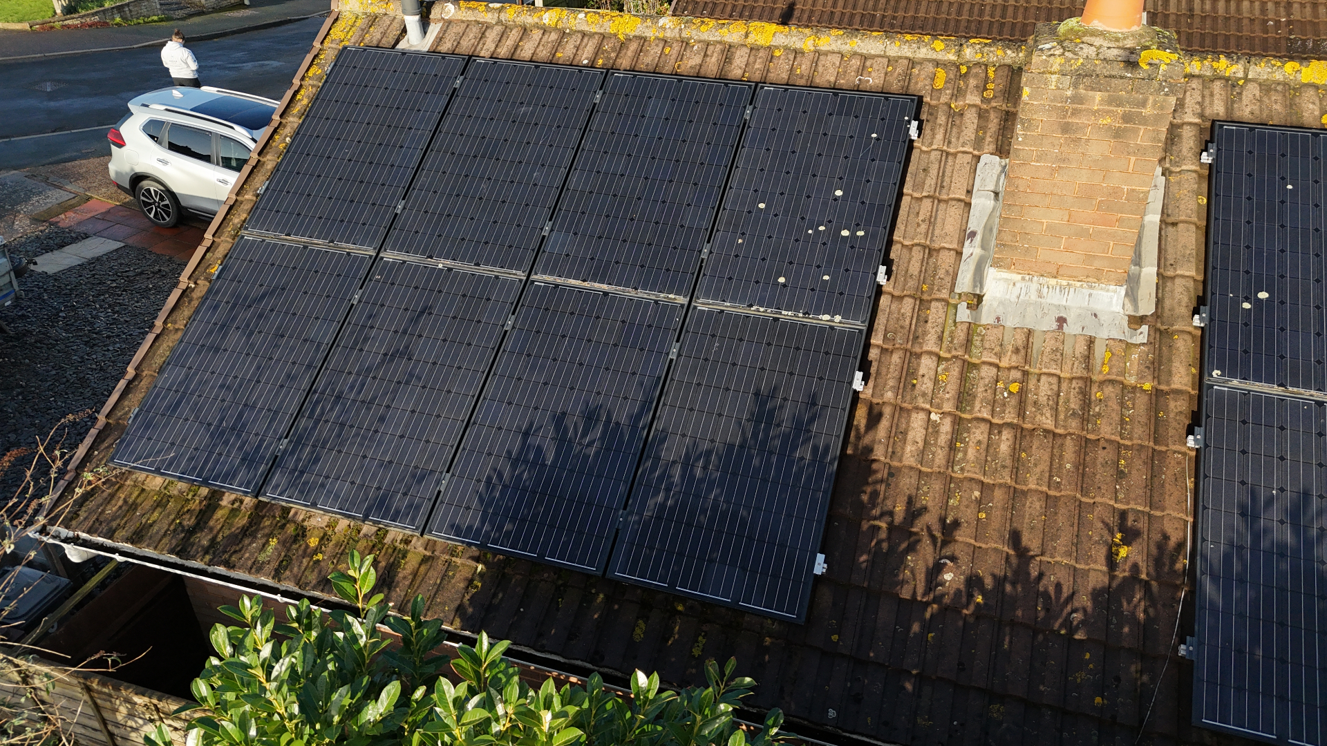 Aerial image used for a solar home buyer report showing rooftop panels on a Devon property