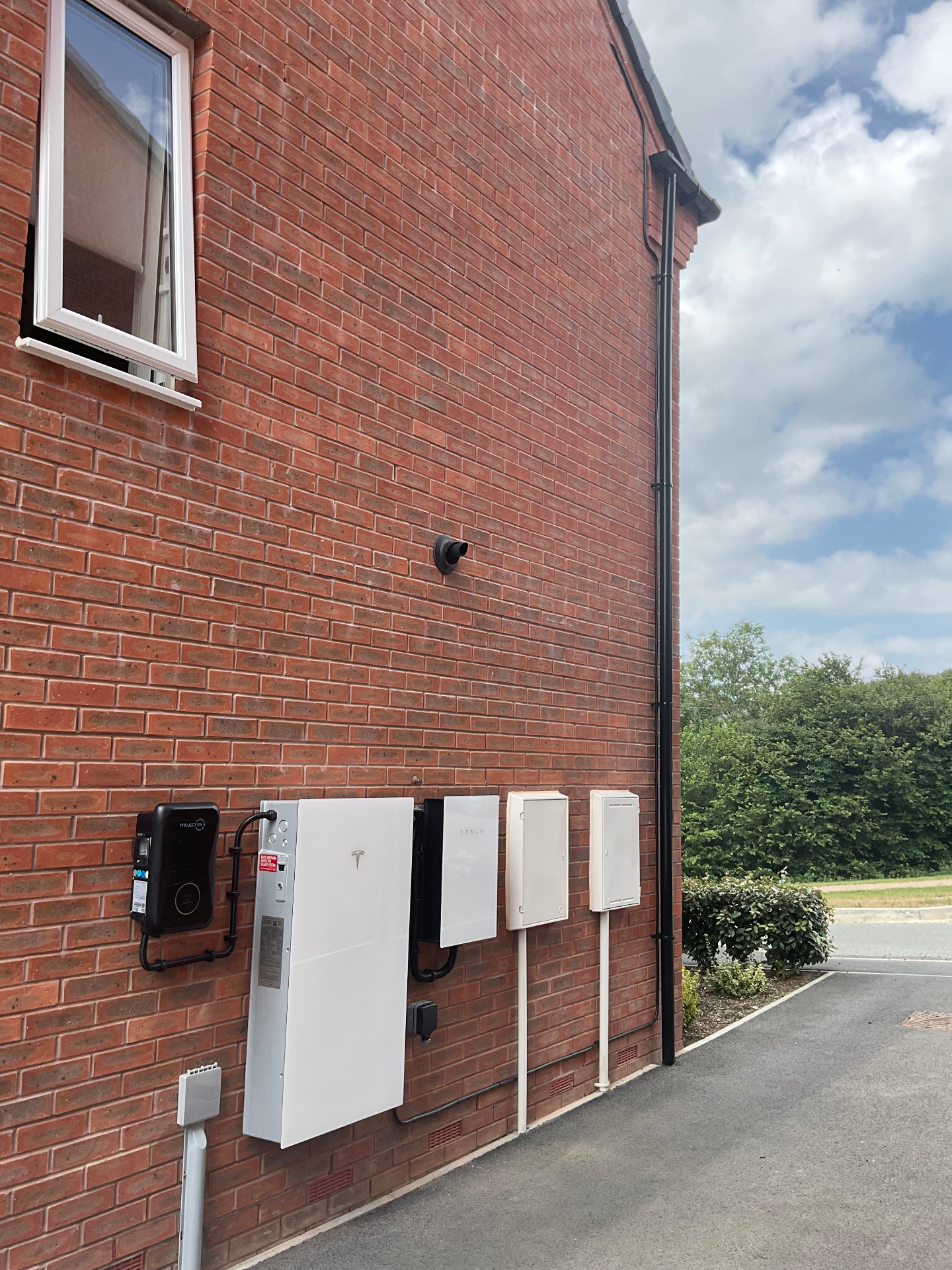 Tesla Powerwall battery and EV charger installation on a Devon property