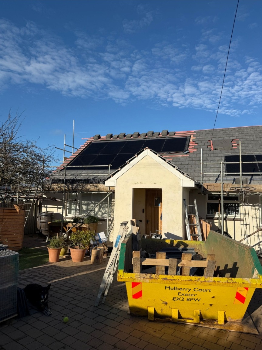 Roof replacement project with solar panels fitted on a Devon home