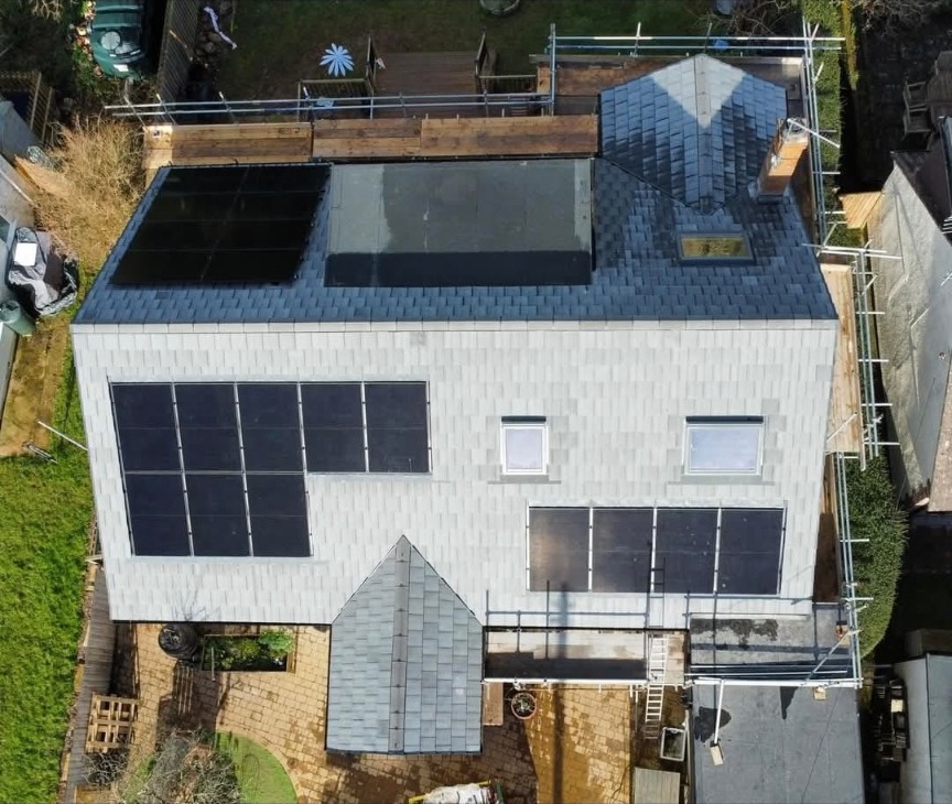 Whole roof replacement project with integrated solar panels completed on a Devon property